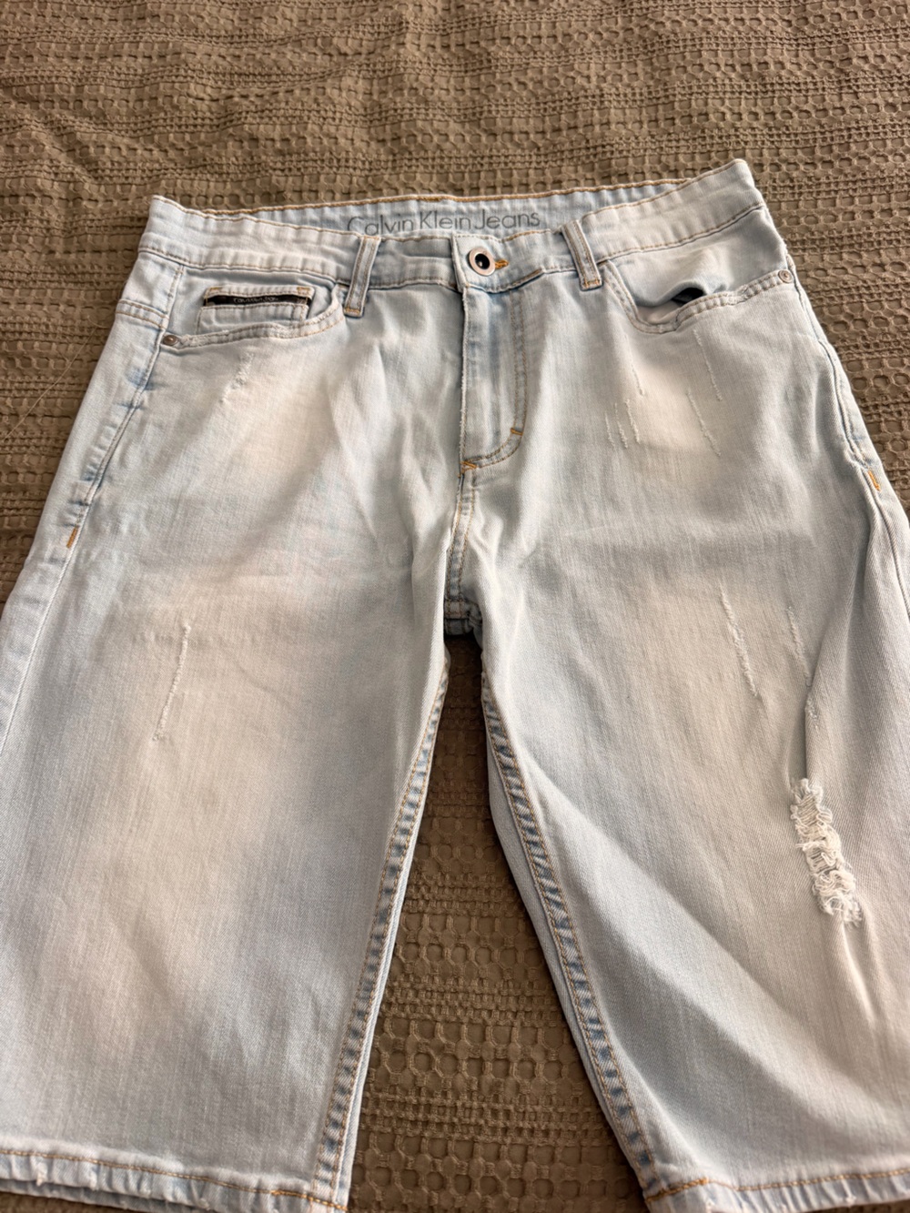 Calvin Klein Light Blue Distressed Denim Shorts